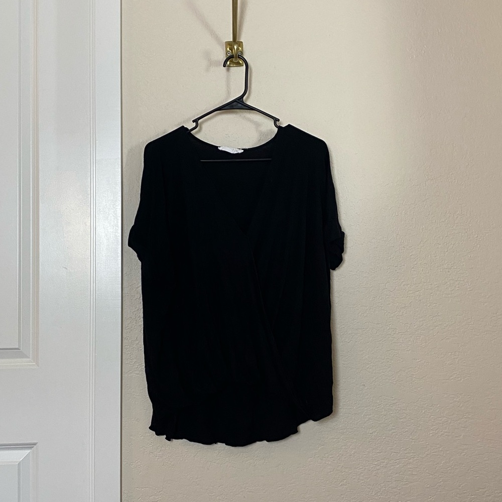 Black blouse. Used. OK condition.